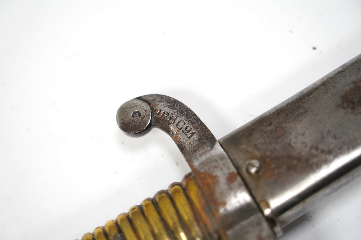 An 1855 French bayonet in its scabbard. Condition - good